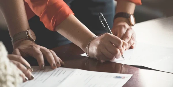 Hwang Law Group, Las Vegas Estate Planning Attorney, for wills, living trusts, power of attorney, & more Hwang Law Group | Las Vegas Estate Planning Attorney | Image of individual signing an estate plan